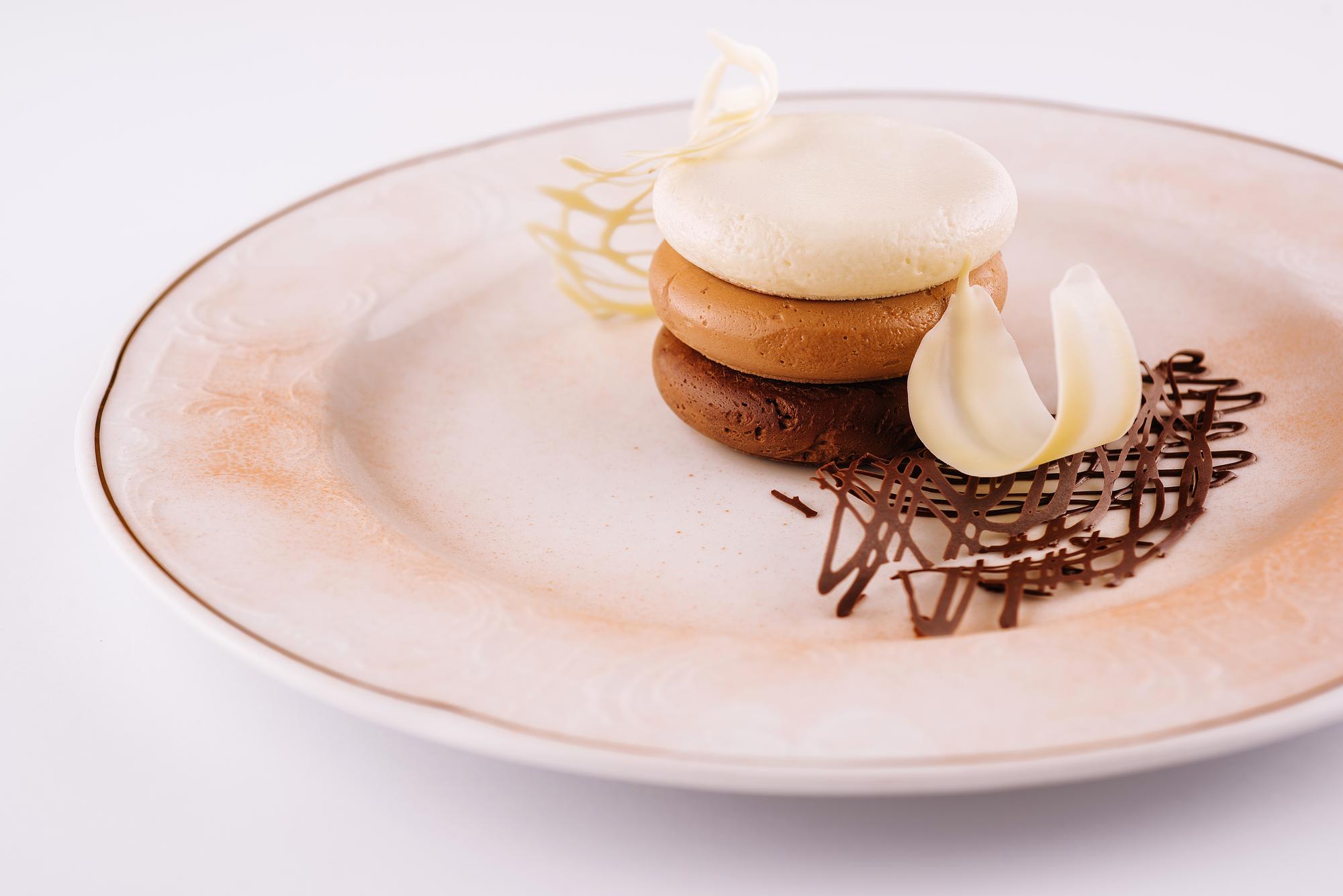 Close-up of plated dessert under warm light